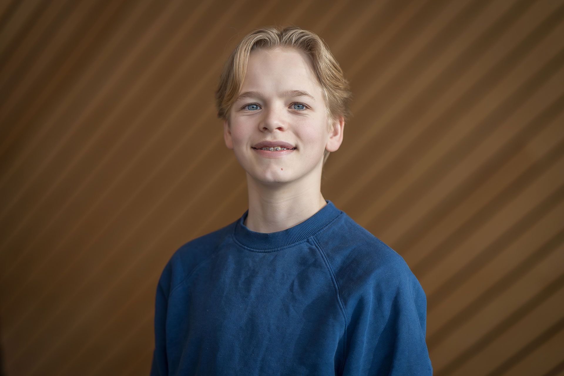 Portrettbilde av Mons Lindebø Mattingsdal i Kildens foajé.
