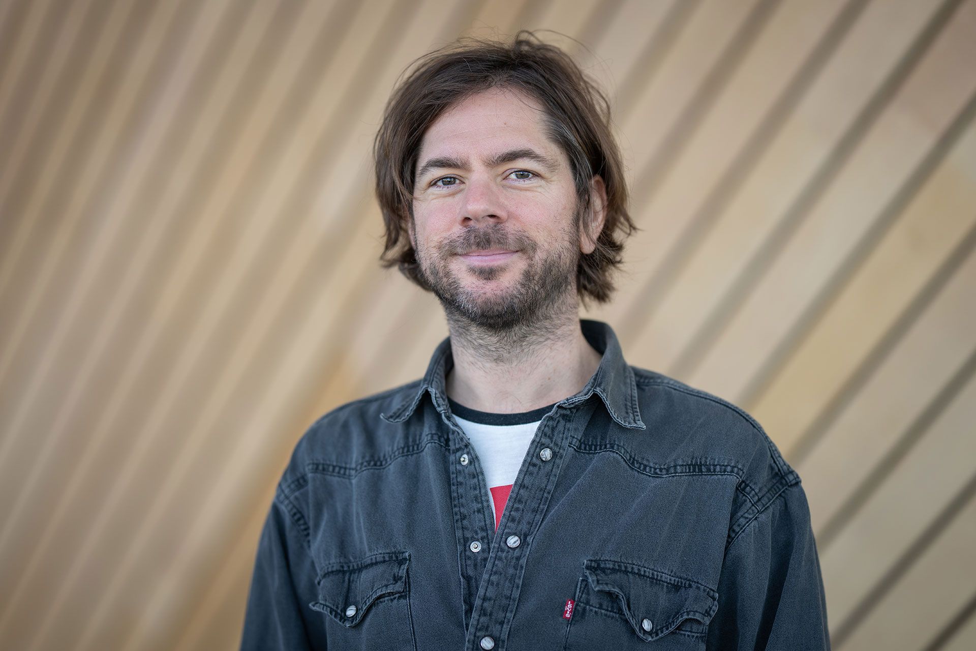 Portrettbilde av Even Hafnor i Kildens foajé