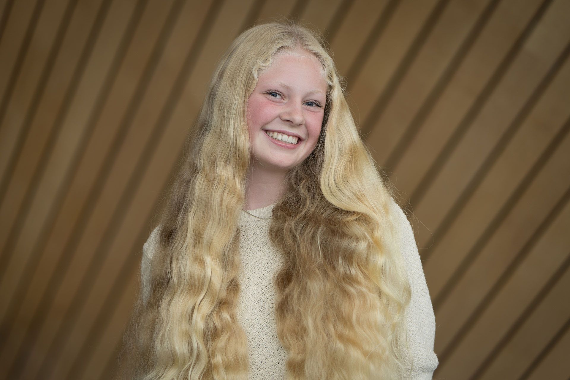 Portrettbilde av Eline-Aanensen i Kildens foajé.