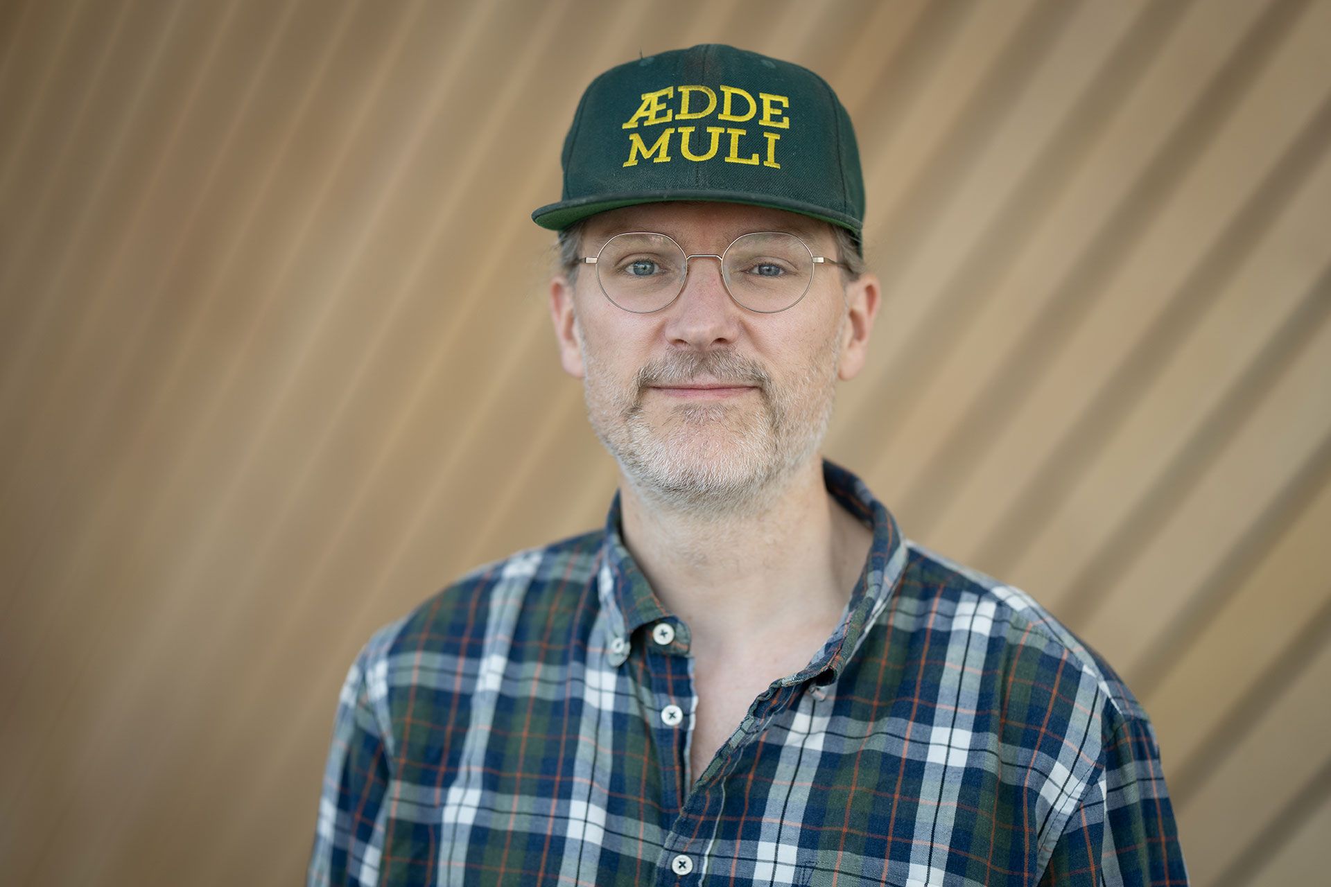 Portrettfoto av Erik Pirolt i Kildens fojé.