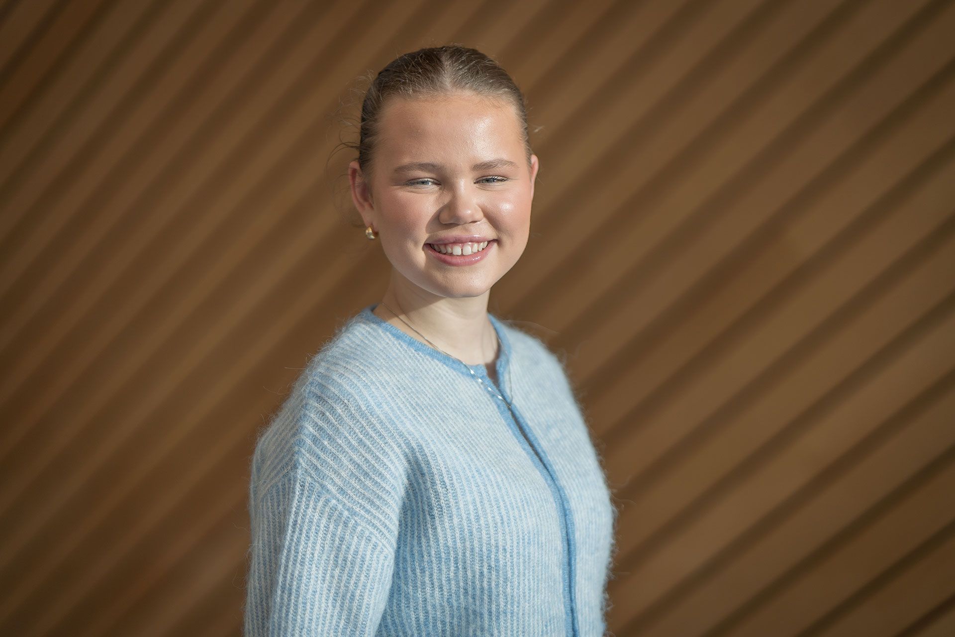 Portrettbilde av Maria Aaby Ranneberg i Kildens foajé.