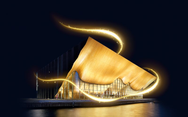 Bilde av Kilden-bygget opplyst i mørket