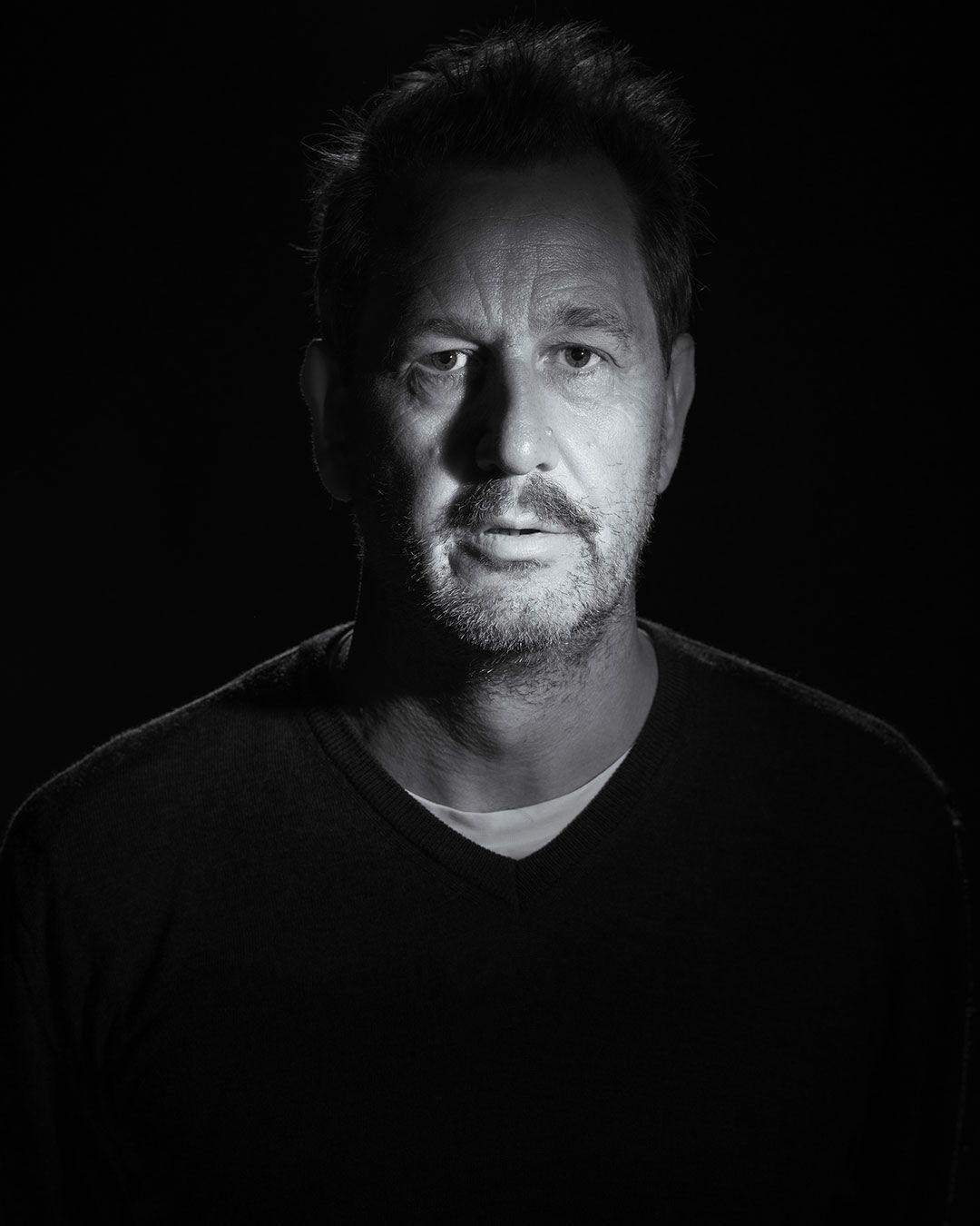 Portrettbilde av skuespiller Henrik Rafaelsen.