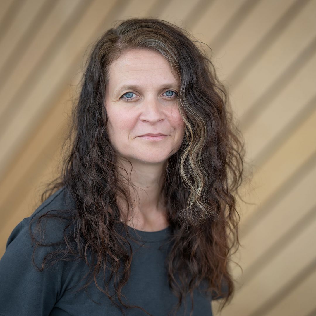 Portrettbilde av Mari Kjeldstadli i Kildens foajé